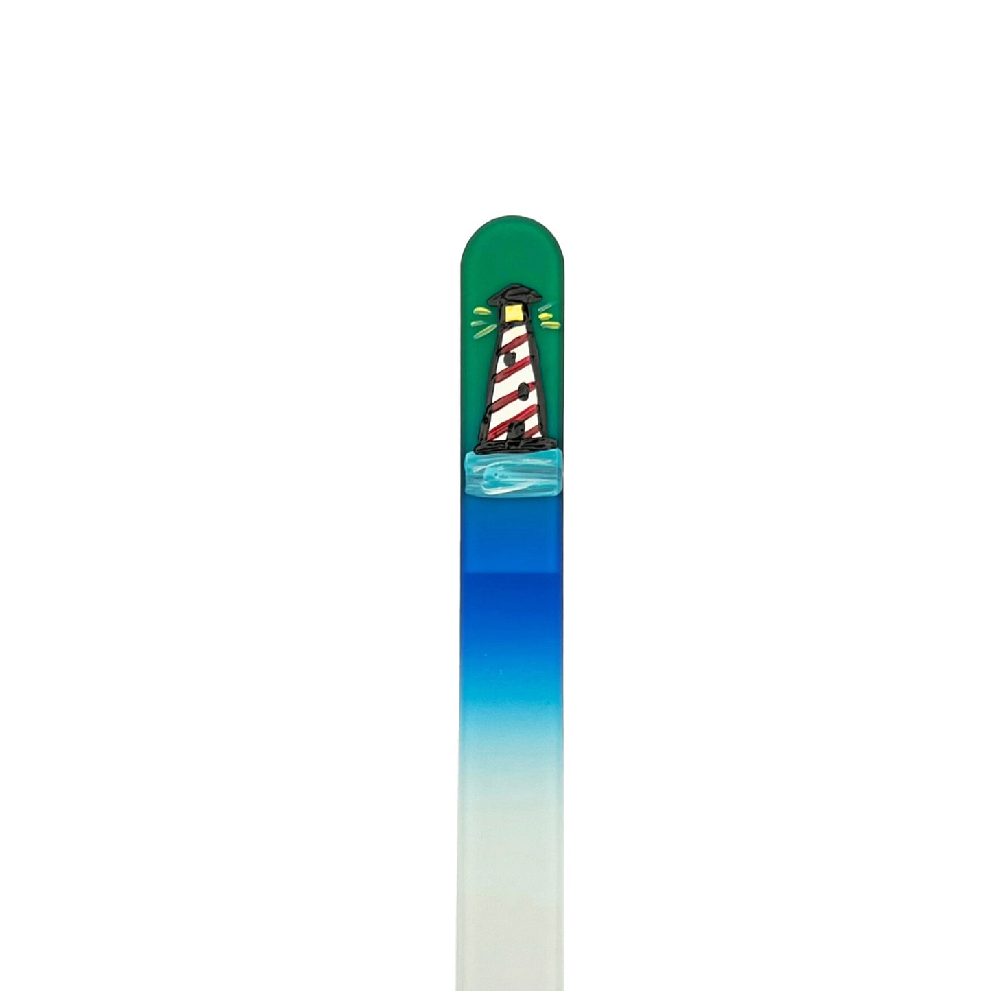 green and blue glass nail file with hand painted lighthouse